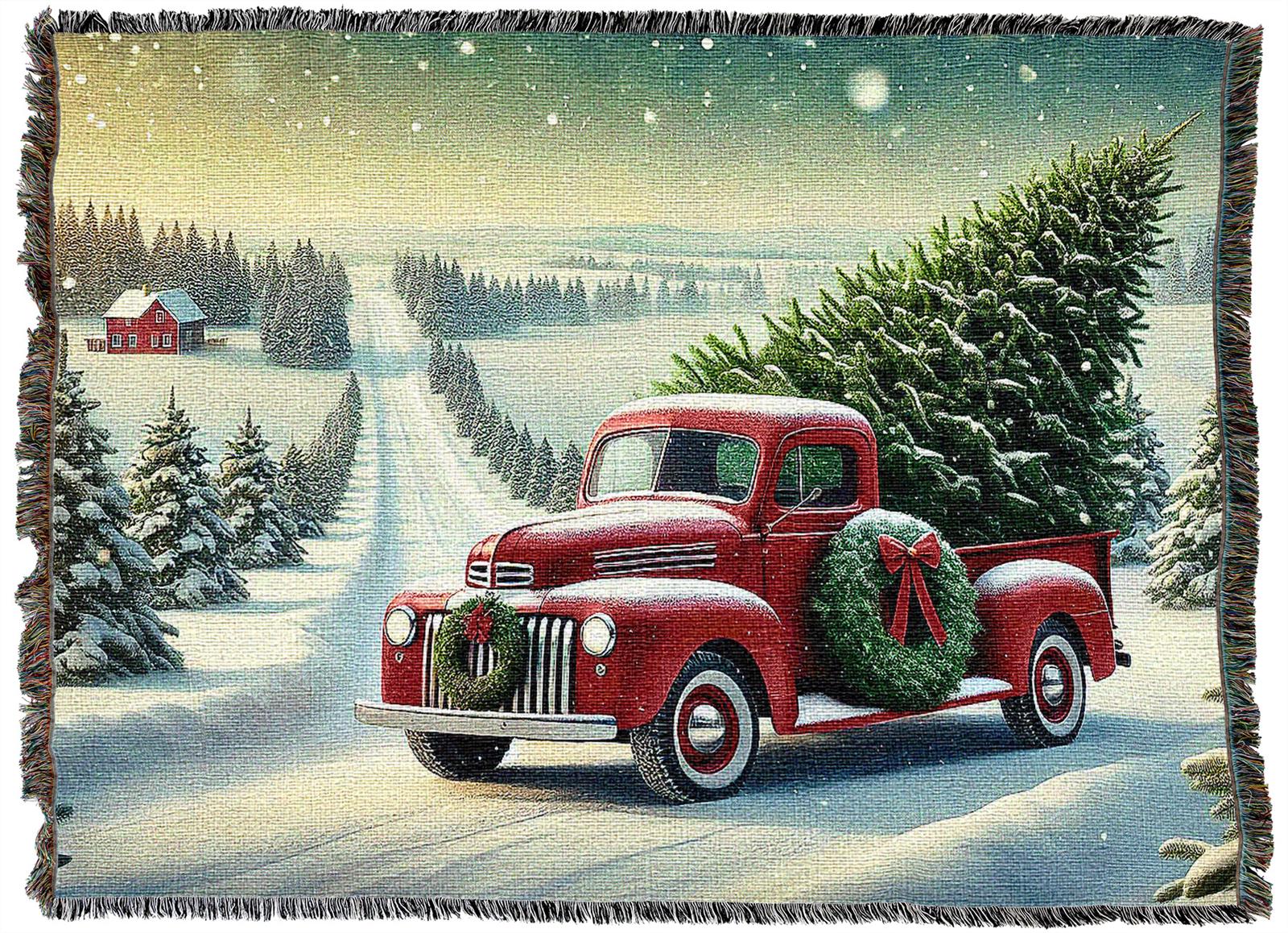 A red vintage truck with a wreath and a Christmas tree in the back drives on a snowy road, surrounded by snow-covered trees and a distant red house under a winter sky.