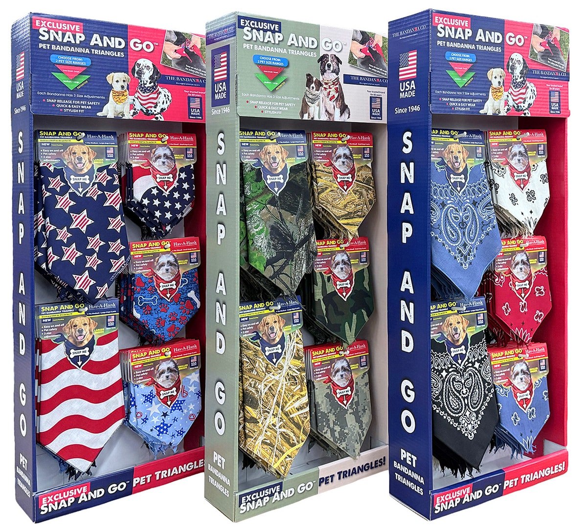 Three display boxes of Snap and Go pet bandana triangles featuring assorted designs, including patriotic, camouflage, and paisley patterns, each modeled by dogs on the packaging.