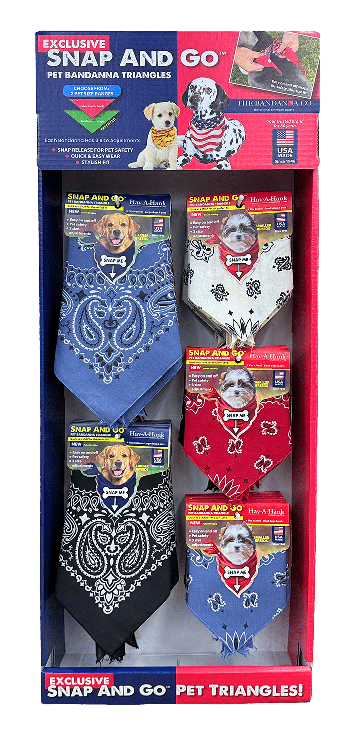 Store display with six pet bandannas in blue, red, black, and white colors, each attached to a cardboard backing and featuring different patterns for dogs, under a sign that says SNAP AND GO Pet Bandanna Triangles..