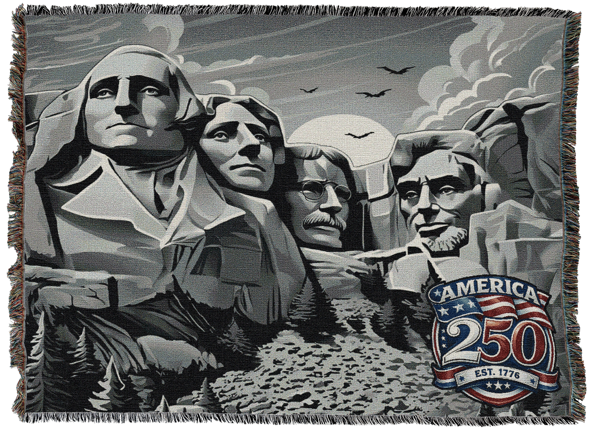 Decorative grey throw blanket showing Mount Rushmore with a sunset and pine trees, plus an American 250 emblem in the lower right.